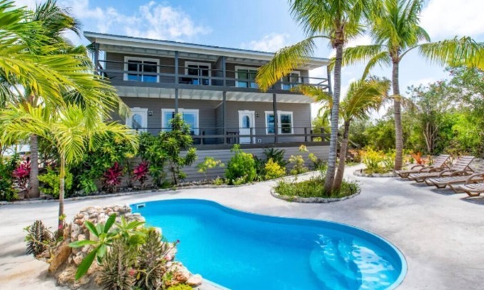 North Palmetto Point Condo | Migrate Beach Chalets #4, sleeps 7. N Palmetto Point. WiFi. AC. Pools. Paradise!