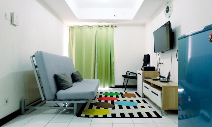 Karet Apartment | Minimalist 1BR with City View The Wave Apartment By Travelio