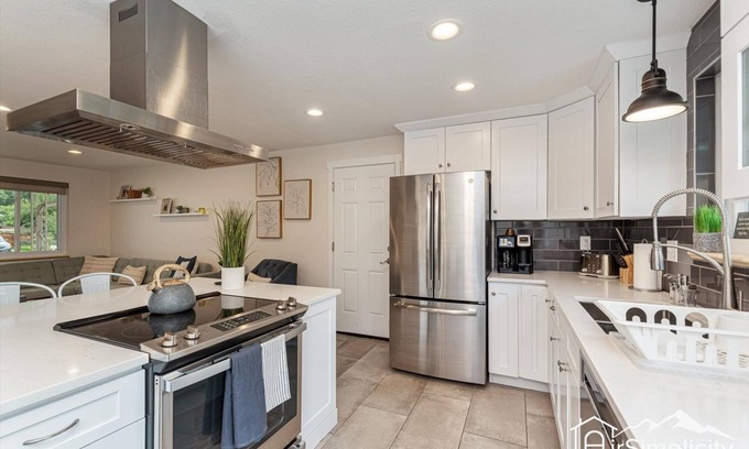 Northwest Arvada House | Mod-Chic Retreat Lux Kitchen Game Rm Patio