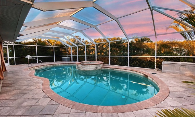 San Carlos Park House | Modern 3 bedroom, 2 bath getaway with HEATED private pool and jacuzzi