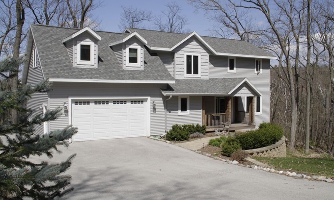 Plymouth House | Modern 3-bedroom home in quiet wooded area very close to Elkhart Lake, Wisconsin