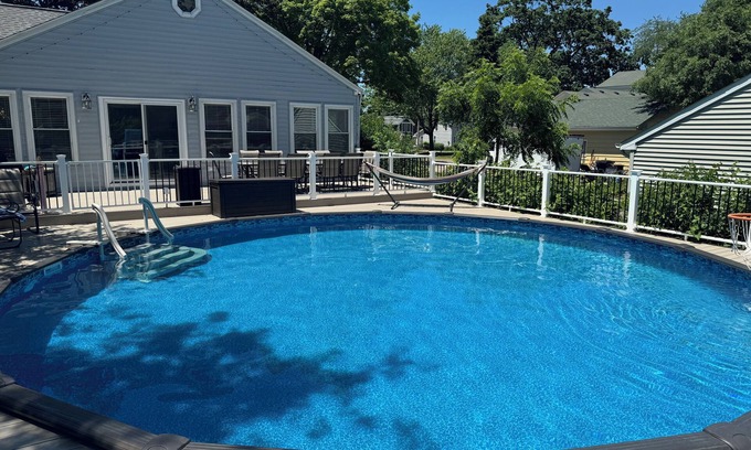 Huntley House | Modern 3 BR with a huge fenced yard and heated pool right by downtown