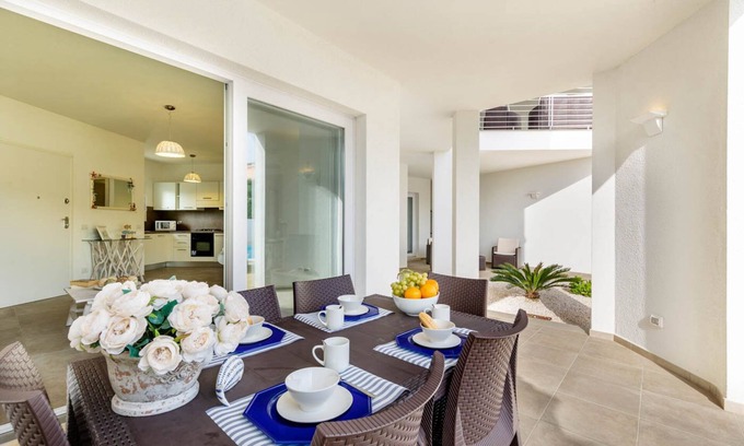 Monte Petrosu Apartment | modern apartment 5 min. from the sea with swimming pool, air conditioning and wi-fi