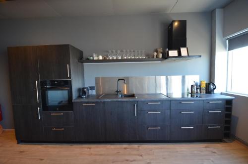 Oddeyrin Apartment | Modern apartment hosted by LL