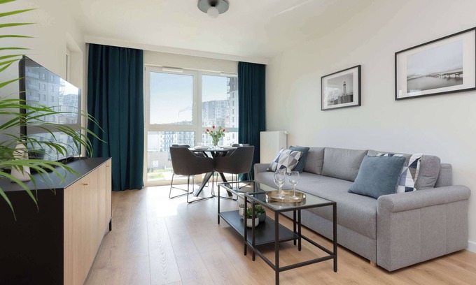 Nowy Port Apartment | Modern Apartment with Parking by Noclegi Renters