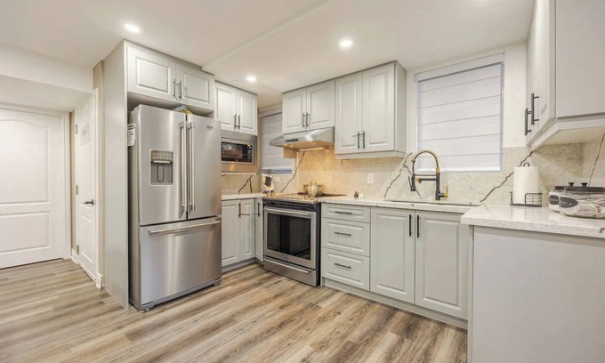 Ajax Apartment | Modern Basement Oasis: Kitchen, Bed, Bath!