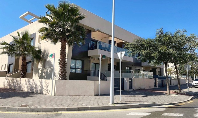 Pueblo Latino Condo | Modern Beach Home + Roof Terrace