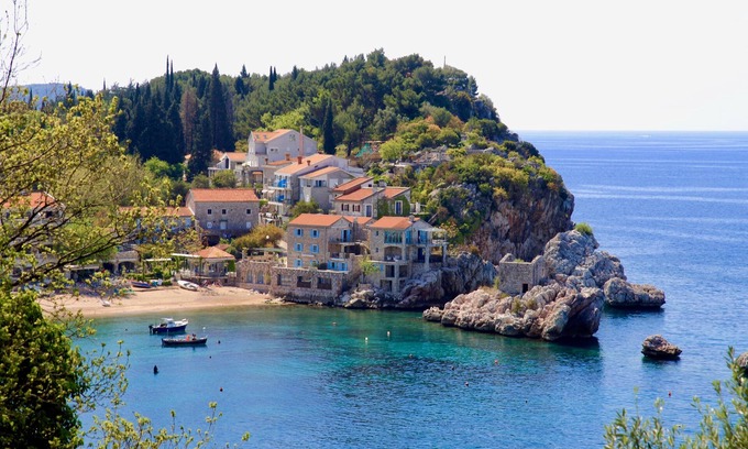 Becici Apartment | Modern Becici apartment with two pools and stunning sea views