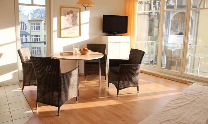 Gohren Apartment | Modern bright apartment, sea view, first row - 200m to the beach, quiet