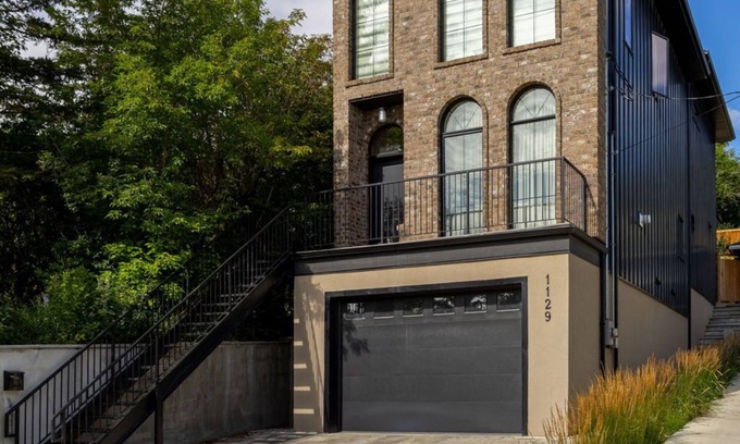 Ramsay House | Modern Brownstone Retreat Near Downtown, Zoo, Saddledome & River Pathways