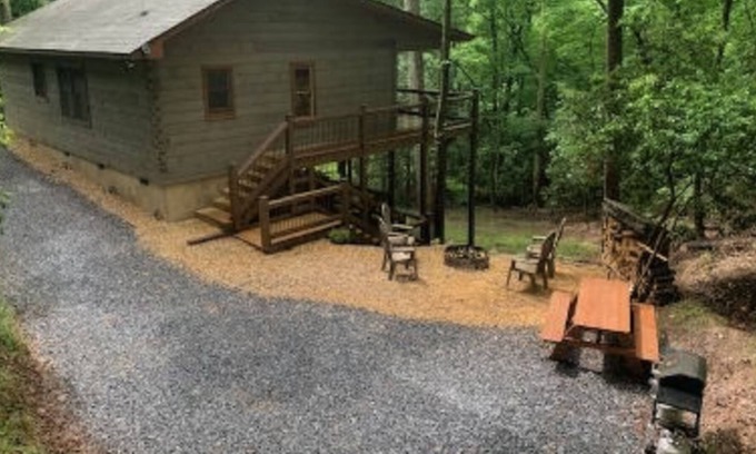 Hidden Lake Cabin | Modern cabin in the woods with private hot tub, firepit, picnic area, AC & WiFi