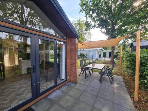 Municipality of Epe Ski Chalet | Modern chalet met ruimte tuin op de Veluwe