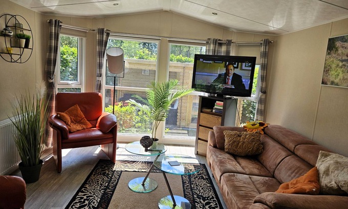 Municipality of Epe Ski Chalet | Modern chalet with cozy porch: the Veluwe Feel Good