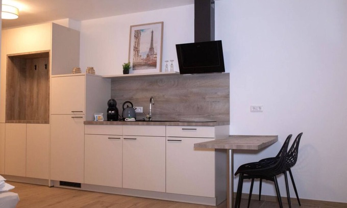 Jollenbeck Condo | Modern cozy purple apartment