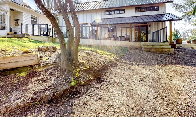 Concord Cottage | Modern creekside cottage with patios, yard & great location for exploring