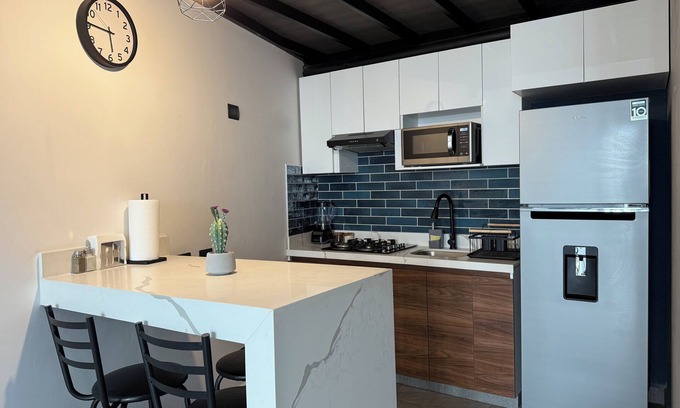Saltillo Apartment | Modern double-height loft new and equipped with its own parking lot