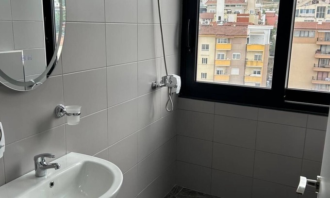 Tirana House | Modern downtown room with private bathroom. Pets allowed.