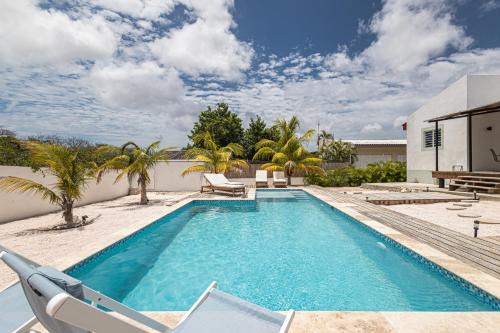 Cas Grandi Villa | Modern family villa with private pool near Mambo Beach & Jan Thiel