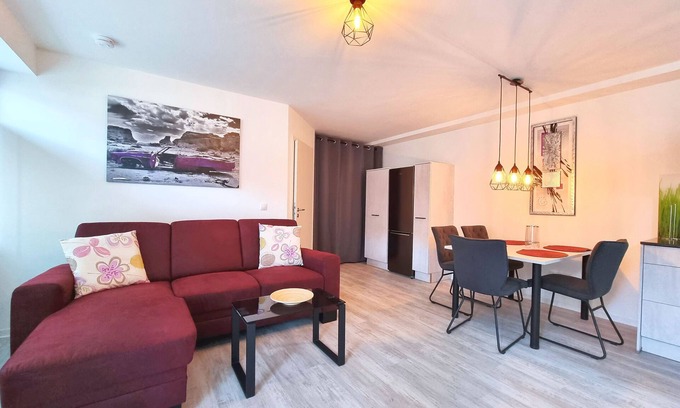 Volkach Apartment | Modern furnished vacation apartment (46 sqm) for up to 4 people with south-facing terrace