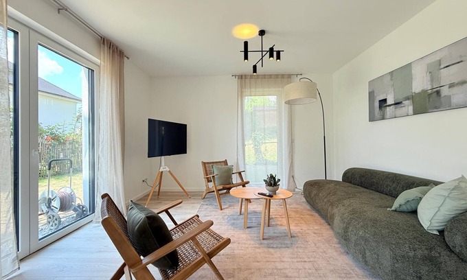 Unteruhldingen Apartment | Modern Harmony suite with covered terrace near the lake and beach in Uhldingen-