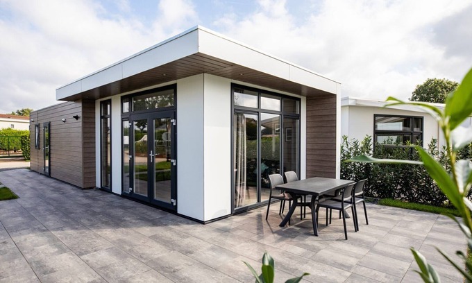 Lathum House | Modern holiday home with a view of a tranquil pond