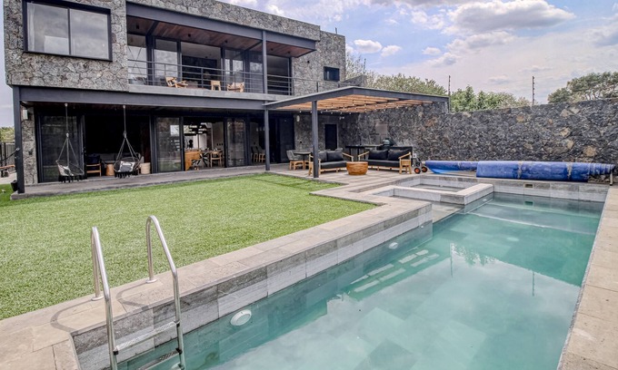 Tepoztlan House | Modern home with a private pool, hot tub, outdoor kitchen, & mountain views