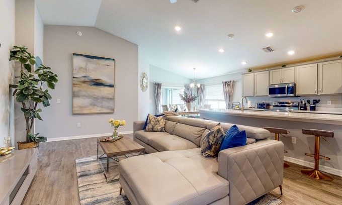 Palmetto House | Modern Home with Sunroom and Dazzling Kitchen