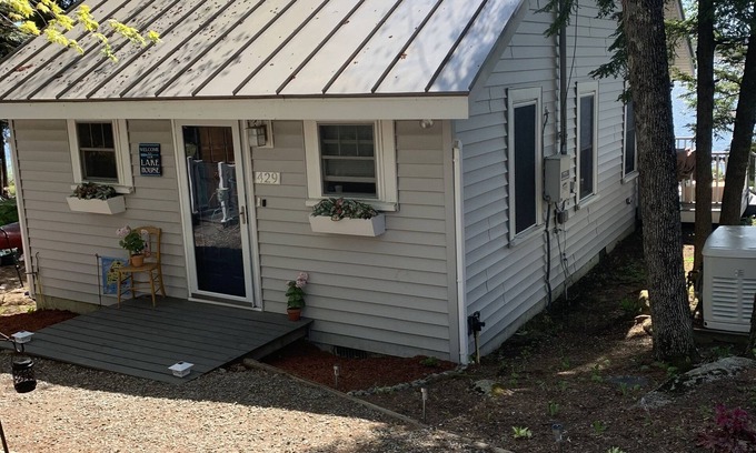 Oakland Cottage | Modern Lakefront Camp on East Pond - cozy fire pit, 3 kayaks, canoe