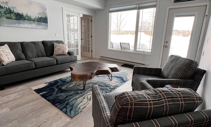 Solon Springs Apartment | Modern Lakeside Condo: Scenic Views & Abundant Amenities Await