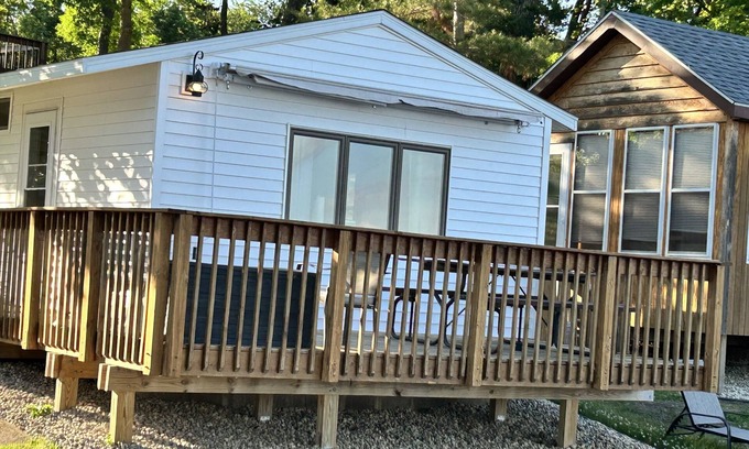 Alexandria Cabin | Modern lakeside cabin with panoramic views and deck.