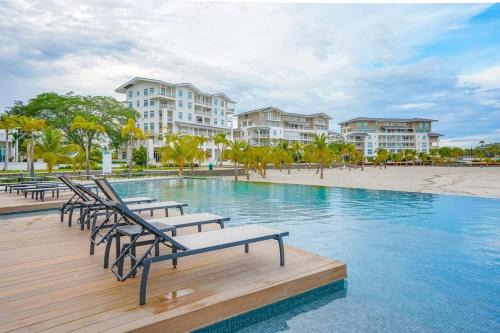 Playa Blanca Apartment | Modern - Marina View Balcony - Exquisite Pool - Sleeps 6