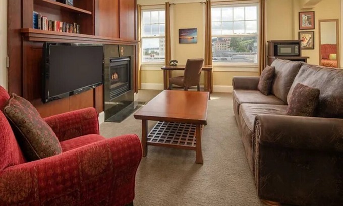 Astoria Hotel | Modern Meets Victorian: Room w/Handcrafted Cabinetry & Heated Tile Floors