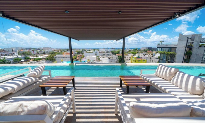 Centro Apartment | Modern PH with 2 Br, Tub & Pool at Arenis Condos