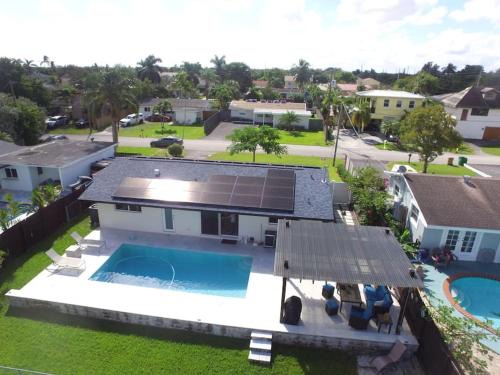 Davie Villa | Modern pool home on the lake near Hardrock FLL airport