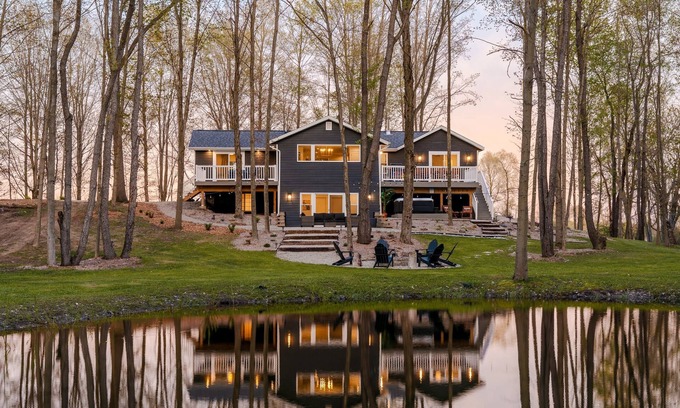 Casco Township House | Modern Retreat Hot Tub Pond Fire Pit