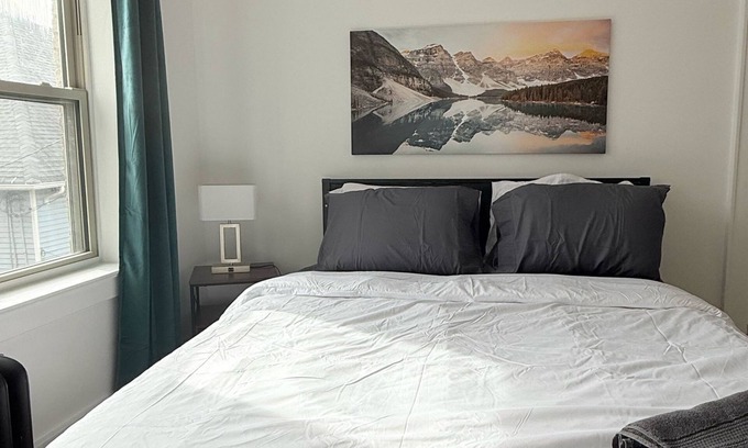 East Avenue Apartment | Modern studio in Downtown Rochester with a full kitchen and Smart TV, steps from High Falls.
