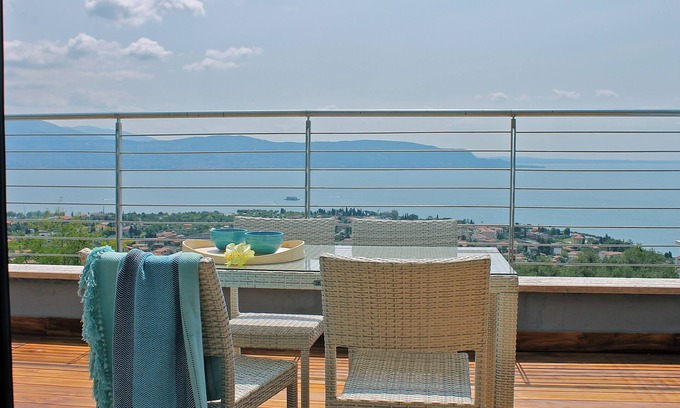 Toscolano Maderno Apartment | Modern style apartment limonaia, with magnificent views of the lake and a large swimming pool