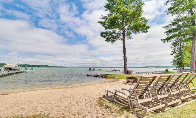 Rapid City Cottage | Modern Torch Lake Cottage w/Dock Near Ski Resorts