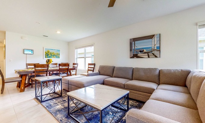 Stuart House | Modern Treasure Coast home with Peloton, EV charger, tennis, patio, & central AC