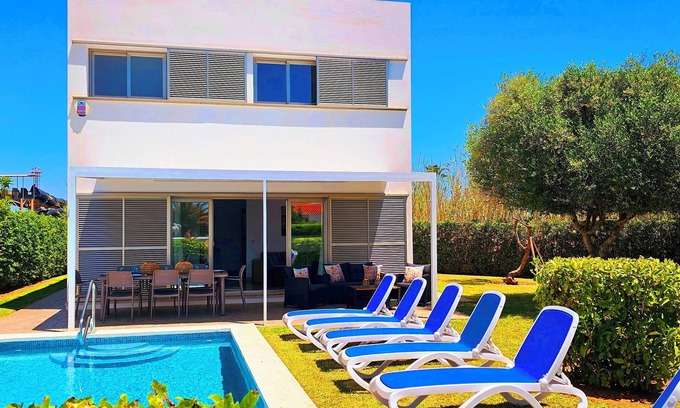 Cala'n Bosch Villa | Modern villa with 4 bedrooms and 3 full bathrooms, wifi, private parking.