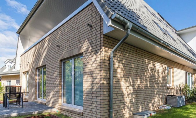 Timmendorfer Strand Apartment | Modern vacation apartment "Bikini Bottom" with garden. Dogs welcome!