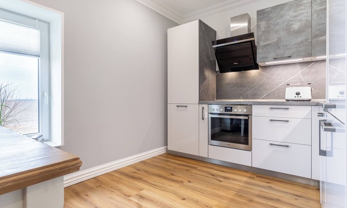 Karolinenkoog Apartment | Modern vacation apartment with a view over the fields near St. Peter-Ording