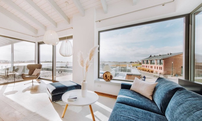 Waase Apartment | Modern vacation apartment on the Bodden with sun terrace, sauna and fireplace