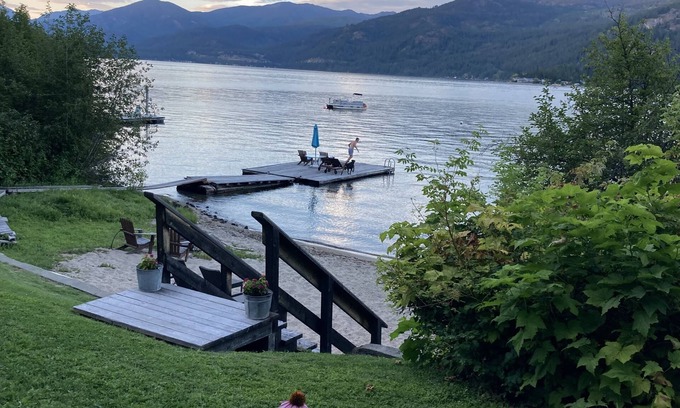Christina Lake House | Modern Vintage Lake Front Cabin. Huge Private Beach and Dock.