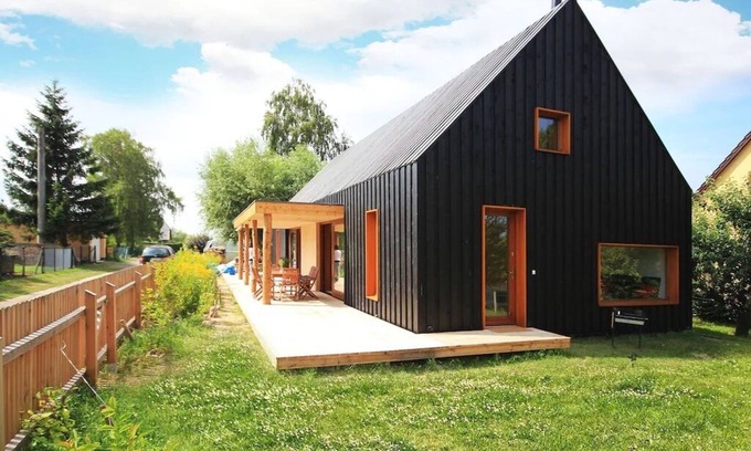 Loissin House | Modern wooden house on the Bodden with two apartments that can be combined