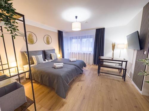 Ellenerbrok-Schevemoor Apartment | Modernes Apartment mit Balkon & Parkplatz, WiFi