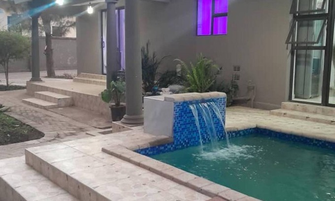 Kadoma Apartment | Modernly Furnished Standard Room With Queen bed - 2220