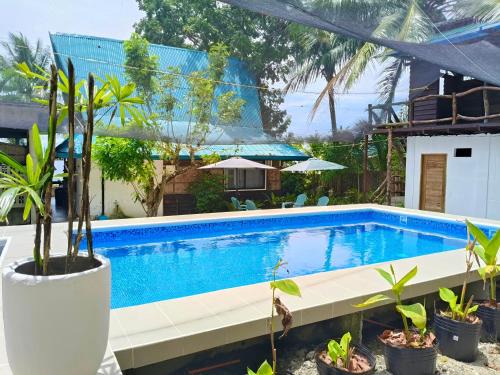 Ginatilan House | Molinillo Vacation Cabin