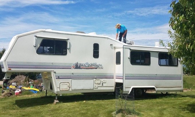 Florence House | Montana Mountain Memories- RV in Orchard by Trout Pond