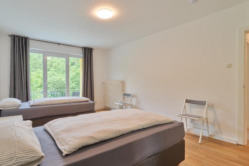 Ehrang-Quint Apartment | Monteurwohnungen in Trier - Parkplatz - Einzelbetten - Waschmaschine und Trockner